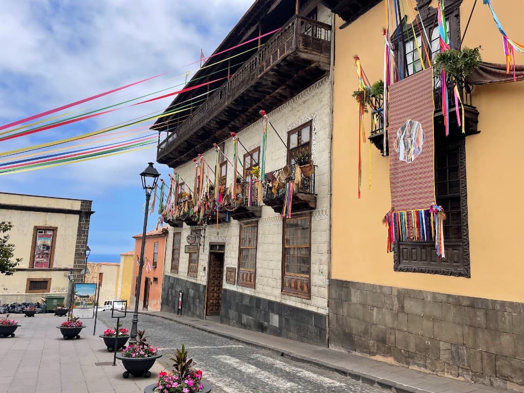 Festival ribbons over a cobblestone street